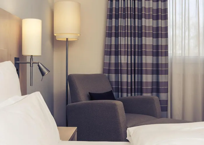 호텔 머큐어 암 프리덴스플라츠 4*